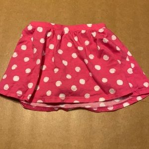 Pink polka dot skirt with shorts